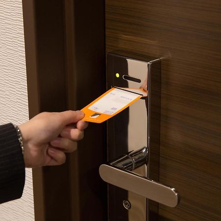 Hotel Tenjin Place Fukuoka  Bagian luar foto