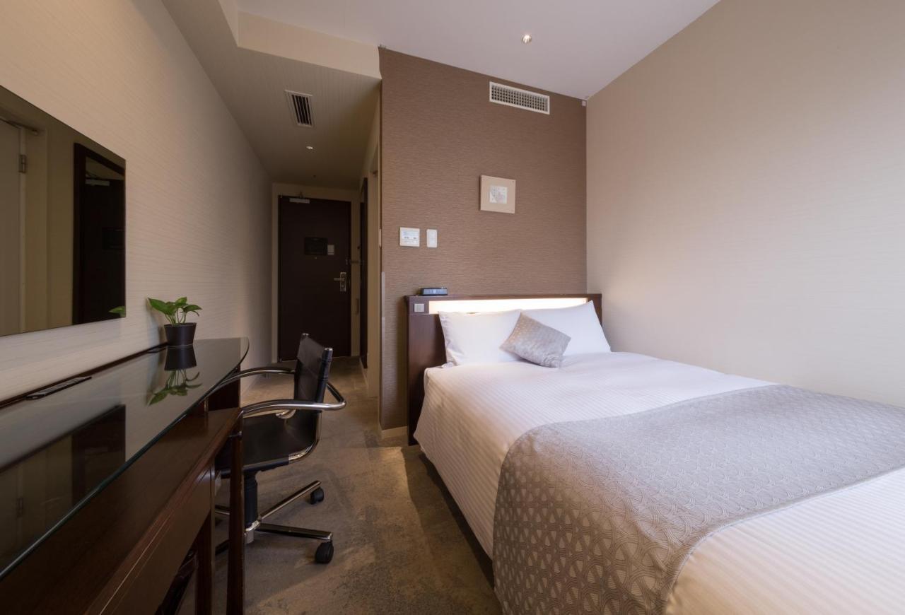 Hotel Tenjin Place Fukuoka  Bagian luar foto