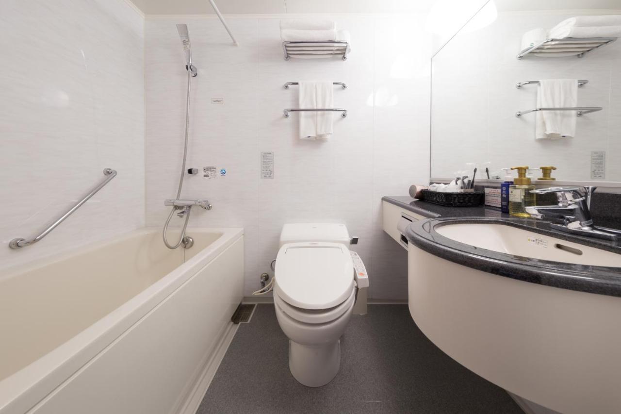 Hotel Tenjin Place Fukuoka  Bagian luar foto